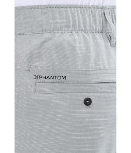 Image of Hurley Men's Phantom 4-Way Stretch Walk Shorts, 7 inch Inseam 18 inch Outseam. Quick Dry, Elastic Waistband