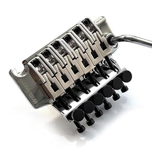 Wilkinson Double Locking Tremolo System Full kit with all mounting hardware included Features steel saddles and baseplate Chrome finish for a sleek, durable look Worldwide shipping on all orders