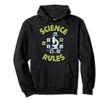 Gran diseño con herramientas científicas con palabras en inglés «Science Rules» para niños y niñas y adultos. El gráfico principal es un microscopio. Es un gran premio científico.