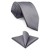 La cravate foulard présente un motif géométrique répétitif soigné, ce qui la rend idéale pour les réunions d'affaires, les événements formels ou même les occasions semi-formelles.