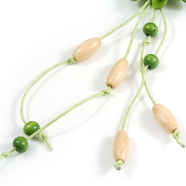 Collier cordon coton vert réglable avec pendentif fleur cuir et pompons bois Avalaya