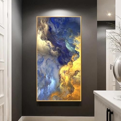 Toile nuages abstraits dorés et bleus éclatants au format panoramique 40x90cm avec cadre