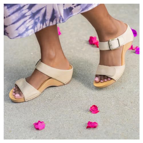 Image of Dansko Tanya Slip-On Wedge Sandal for Women - Cushioned, Contoured Footbed for All-Day Comfort and Support - Hook & Loop Strap with Buckle Detail - Lightweight Rubber Outsole