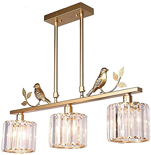 Lampe suspendue cristal et laiton pour supprimer les zones sombres de votre salle à manger