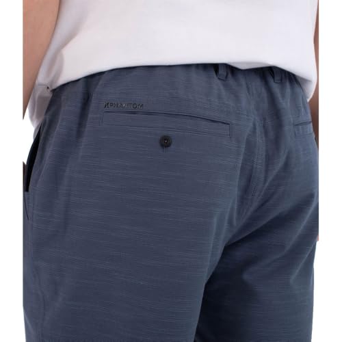 Image of Hurley Men's Phantom 4-Way Stretch Walk Shorts, 7 inch Inseam 18 inch Outseam. Quick Dry, Elastic Waistband