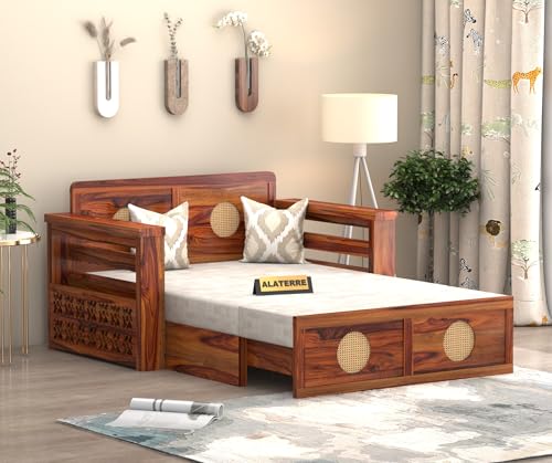 Image of ALATERRE HOME FURNITURE Solid Sheesham Wood Two Seater Sofa Cums Bed with Cane Design Panels | 2-in-1 Wooden Daybed with Cushion & Storage Drawers (Honey Finish)