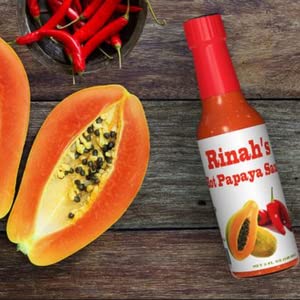 Miniatura 2 de Salsa picante de papaya hecha con papaya. Salsa picante estilo caribeño de Rinah. Pimientos habaneros, sal y condimentos. Paquete de 4. Ideal para