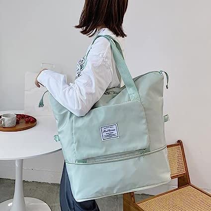 Image of K D Foldable Travel Duffel Bag, Large Capacity Folding Travel Bag, Travel Lightweight Waterproof Carry Luggage Bag (58 L x 41 H X 22 W cm) (Pack of 1) (Ice Green)