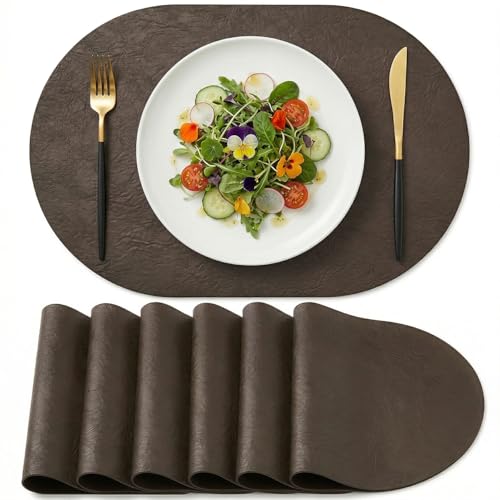 Artoid Mode Coffee Brown Faux Leather Oval Placemats Set of 6, 12 x 18 Inch Waterproof Wipeable Heat Resistant Vinyl Place Mats, Reversible Table Mats for Kitchen Dining Decor by Artoid Mode - Used condition - US$16.98