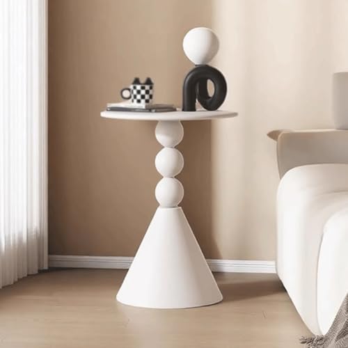 Table d'angle polyvalente ronde pour optimiser l'espace dans les studios et chambres