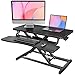 HUANUO Standing Desk Converter, 80cm/32'' Height Adjustable Desk Riser with LARGE Keyboard Tray, Sit Stand Desk Riser for Dual Monitor with Smooth Pneumatic Lift System, Computer Workstation