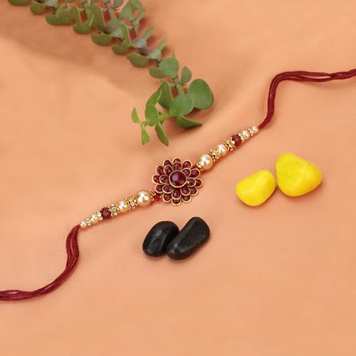 Image of Riddhika Ventures Alluring Gold Plated Floral and Pearl Rakhi (Bracelet) with Roli Chawal & Greeting Card