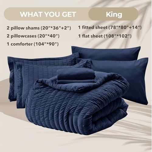 Image of HYMOKEGE Navy Blue King Size Comforter Set Seersucker 7 Pieces, All Season Luxury Bed in a Bag for Bedroom, Bedding Set with Comforters, Sheets, Pillowcases & Shams