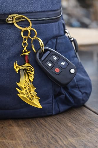 Image of BLUE WARRIOR God of war keychain (gold)- Fantasy Winged Dagger Keychain - Antique Gold Mini Sword Key Ring with Red Handle - Metal Collectible Key Holder for Men, Women, Gamers & Gift Giving