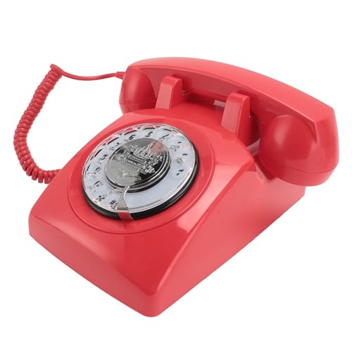 Téléphone rotatif rétro rouge vintage des années 1960 avec cordon