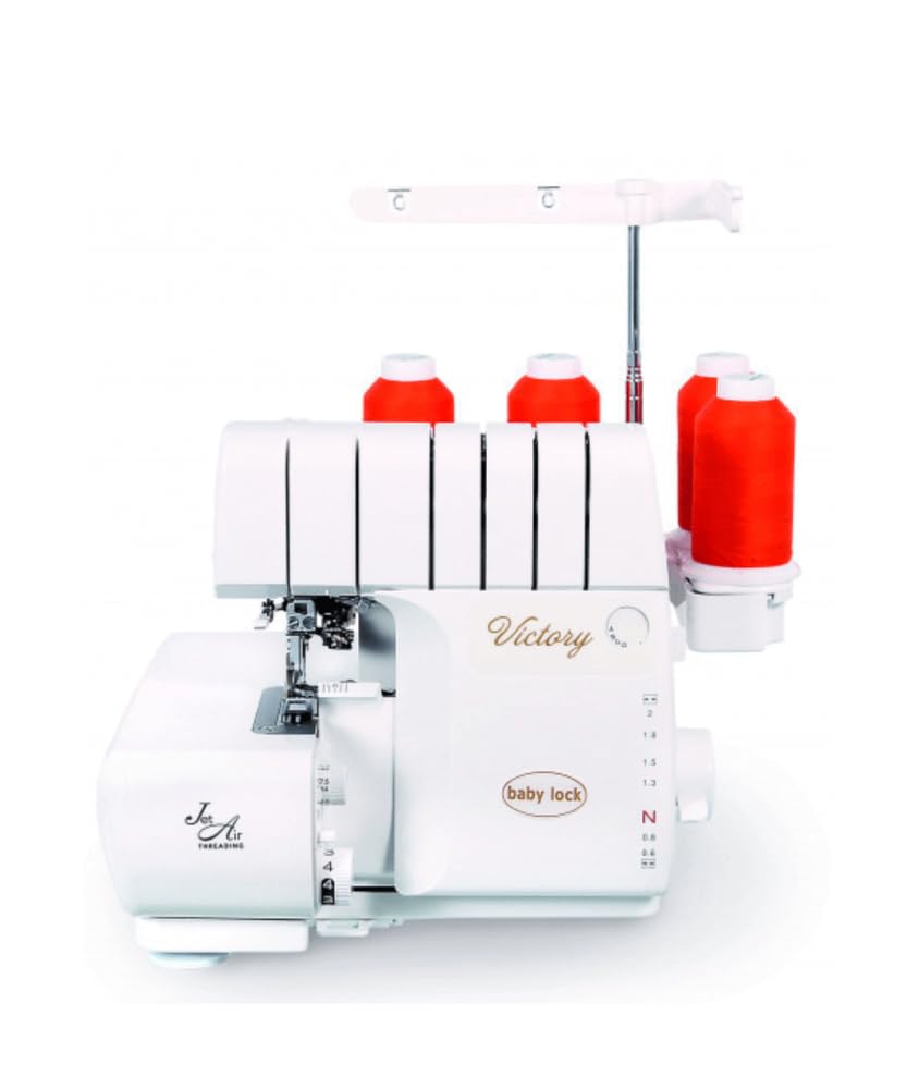 Збоку view of Baby Lock Imagine overlock machine showing the stitch length and differential feed adjustment dial.