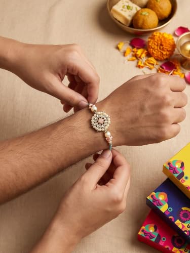 Image of Karatcart Rakhi for Brother Gold-Plated Kundan Rakhi Set of 2 with Roli Chawal