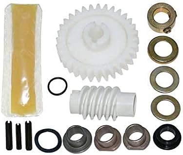 Close-up of the new gear sprocket assembly installed inside a garage door opener unit.