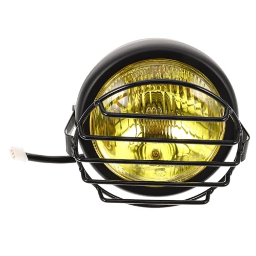 Phare moto vintage rond noir pour rouler de nuit en toute sécurité sur votre café racer