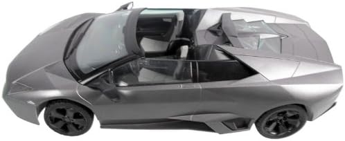 Жогорудан төмөн view of the Rastar Lamborghini Reventon Roadster RC car, showing the sleek design and potential battery compartment location on the underside.