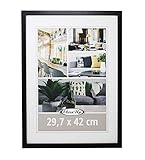 Dieser schwarze Posterrahmen im Format 29,7 x 42 cm bringt Poster, Fotos oder jegliche Art von Kreativität perfekt zur Geltung