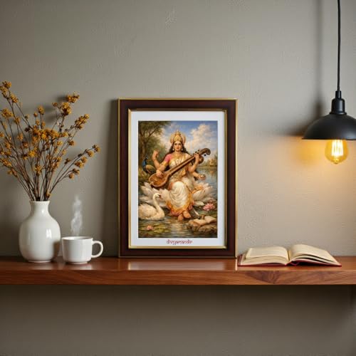 Image of divyamandir Maa Saraswati Framed Wall Art (18 x 14 Inches) | Traditional Hindu Goddess Painting with Glass Frame | Decorative Photo Frame for Home, Pooja Room & Office Decor (Maa Saraswati)