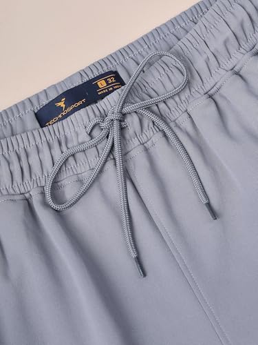 Image of TECHNOSPORT Men's Slim Fit Track Pants with Zip Pockets, ELASTO Plus Quick Dry Stretchable Lightweight Lower for Gym Running Yoga and Sports