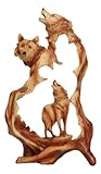 Cette belle sculpture en bois en forme de famille de loups mesure 31,8 cm de haut, 15,9 cm de long et 7 cm de profondeur environ.