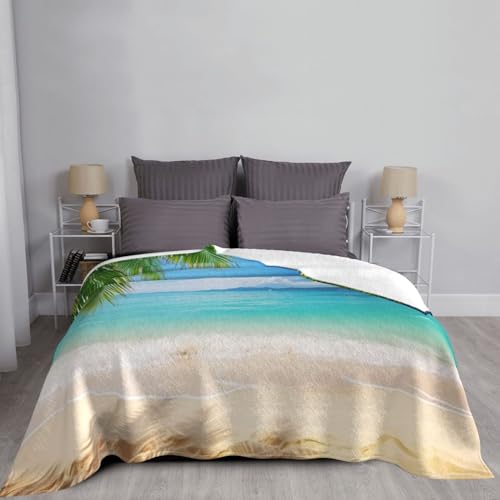 Couverture flanelle légère contre les nuits fraîches motif palmier