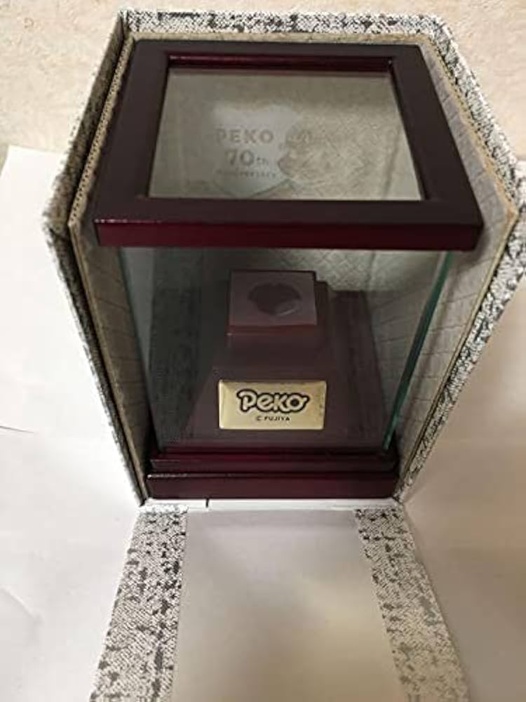 ペコちゃん70周年記念　純金フィギュア Amazon.co.jp: ペコちゃん70周年記念 純金フィギュア : おもちゃ