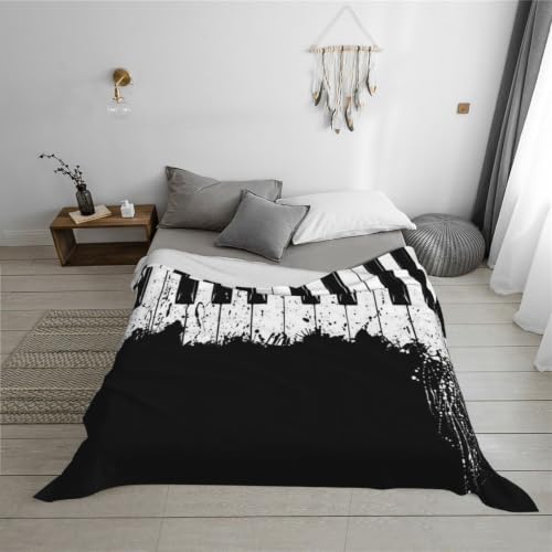Couverture en flanelle piano 200x150 cm douce et chaude pour canapé