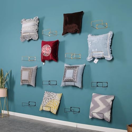 Support mural doré de luxe pour coussins décoratifs de boutique