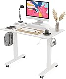 FEZIBO Escritorio de Pie Manual - 100 * 60 cm Escritorio Mesa Ajustable en Altura de Acero con Controlador de Manivela, Caja de Cables, 2 Ganchos, 4 Ruedas Función de Rreno Domicilio, Blanco