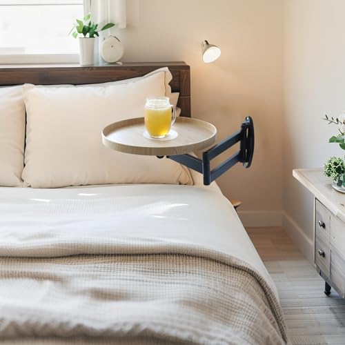Table murale ronde pliante pour un coin repas de studio optimisé
