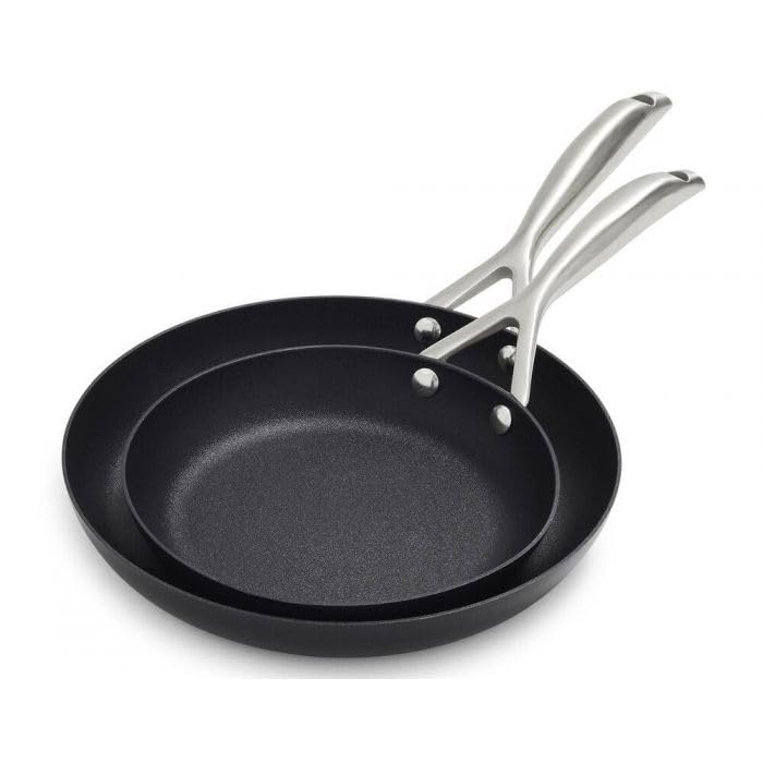 Scanpan Pro S+ Skillets, set of two, nested, showing their black non-stick interior and stainless steel handles.