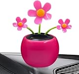 Design joyeux : dispose d'un tournesol rose rouge vif dans un pot décoratif qui ajoute une touche amusante et fantaisiste à l'intérieur de votre voiture