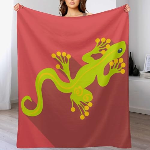 Couverture polaire gecko vert pour réchauffer vos soirées cocooning