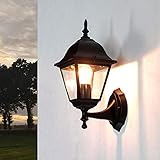 Rustikale Außenwandleuchte im Stil einer klassischen Laterne: Mit dieser eleganten Wandlampe setzen Sie Ihre Fassade, den Eingangsbereich, die Terrasse oder den Hof ins richtige Licht!