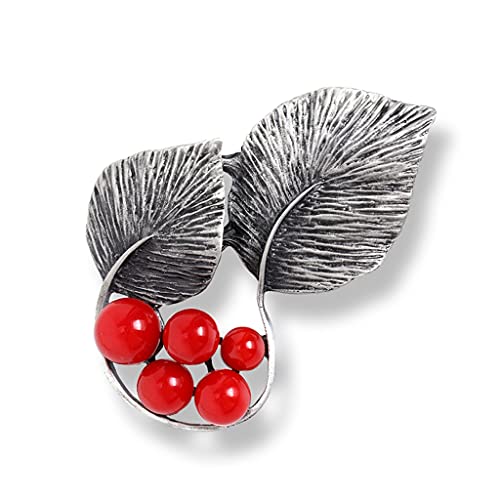 Broche feuilles de pierre rouge : l'accessoire idéal pour styliser un manteau