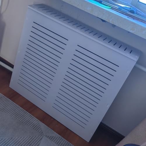 Mueble con repisa para radiador que decora y protege el salón de forma elegante 8