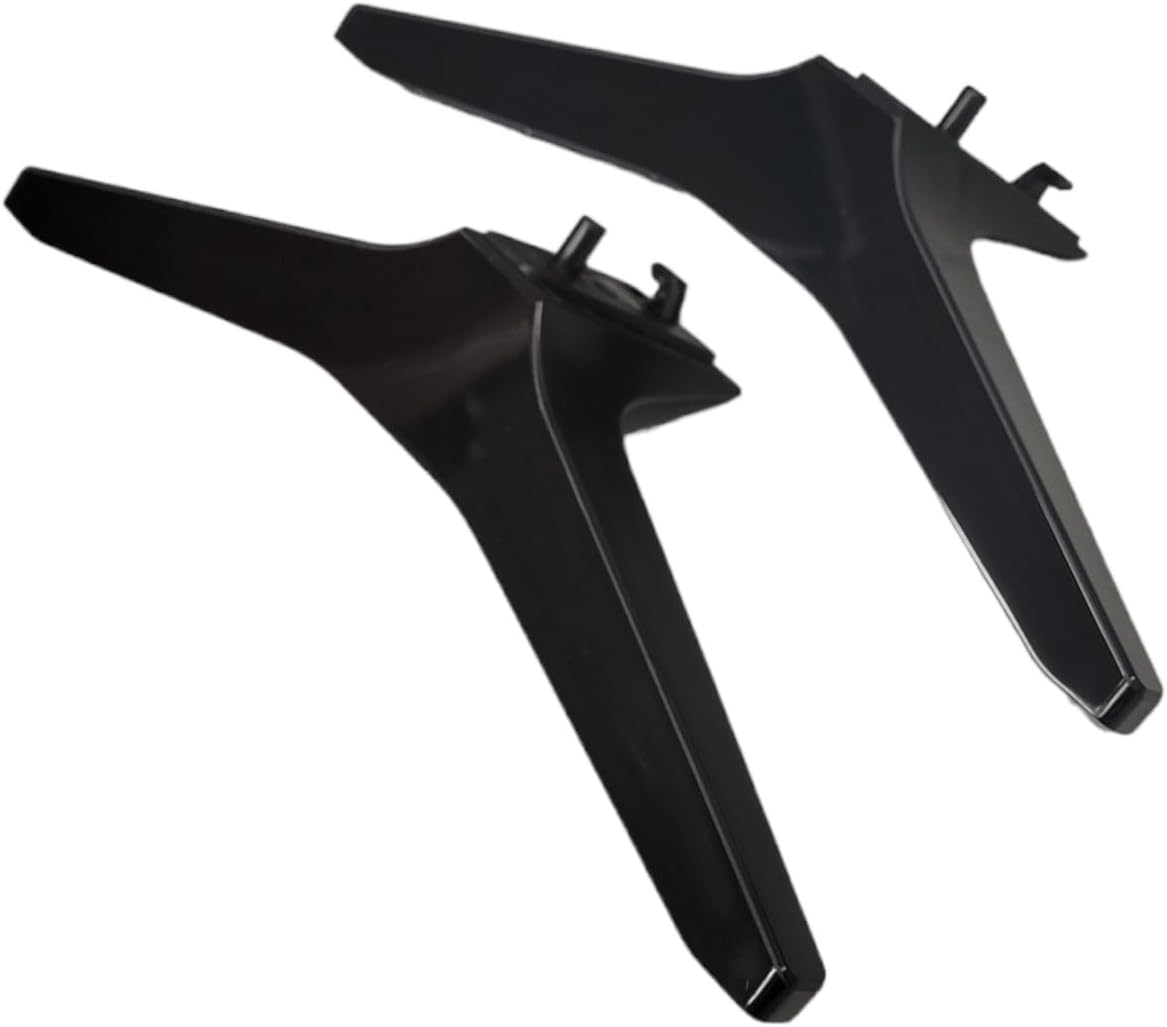 Close-up of the bottom of a TV stand leg, showing a screw being inserted into a mounting hole