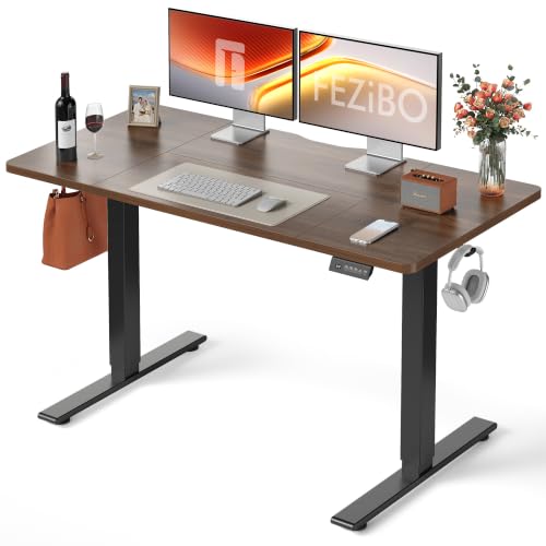 Image of FEZIBO Electric Height Adjustable Standing Desk with digital display control panel, 70x140cm Ergonomic Home Office Table for sit stand with Splice Board & BlackWalnut Wood Grain Surface