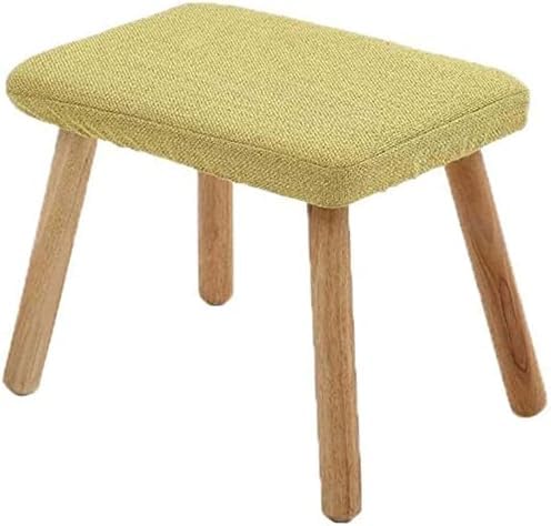 Pouf repose-pieds vert et bois pour créer un coin lecture cosy sur la terrasse
