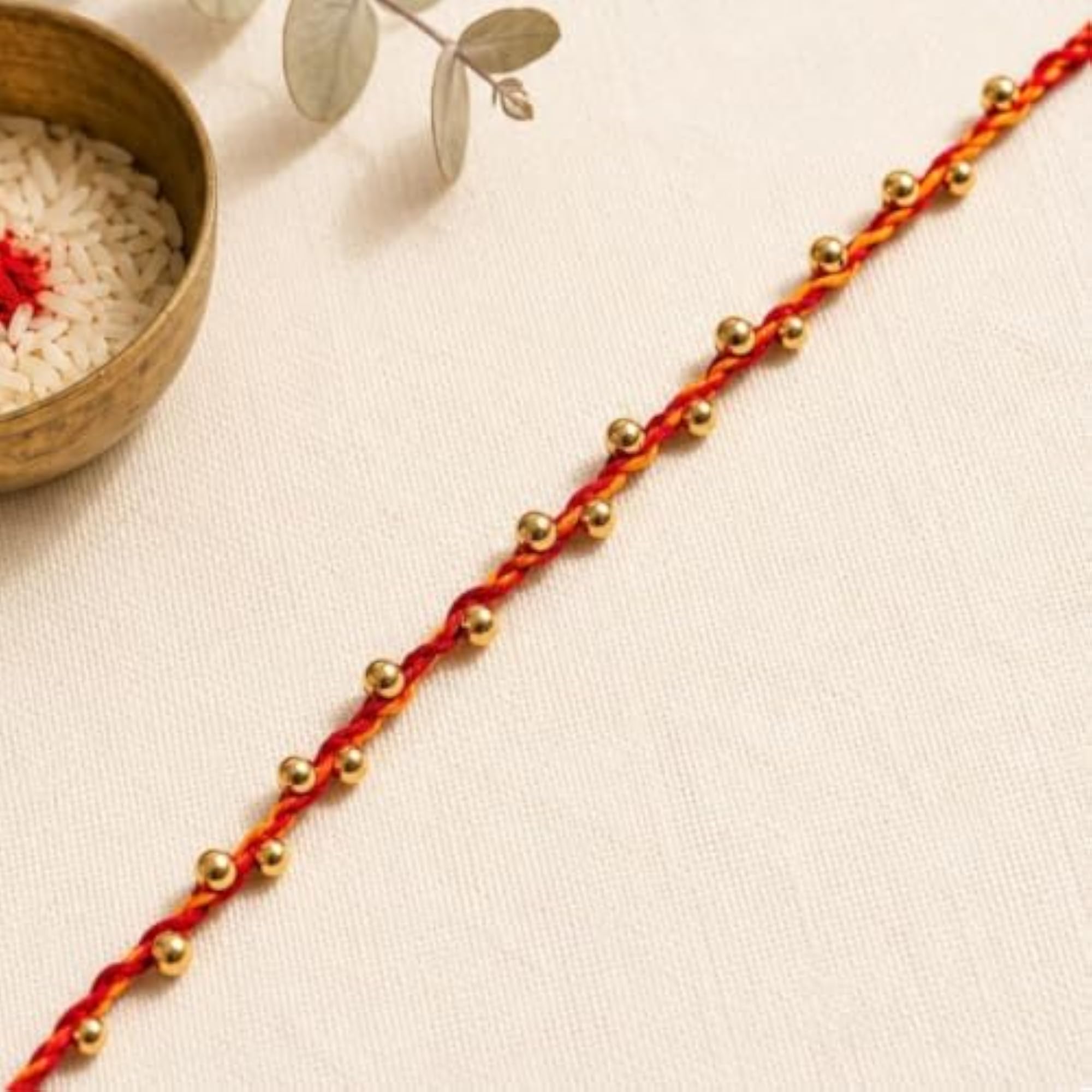 Traditional Silver Tone Beaded Rakhi for Brother