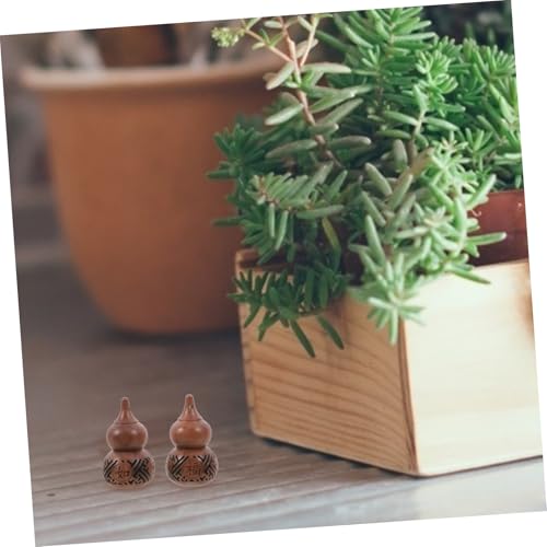 Sachet de madera con escultura calabaza 2 pcs miniatura 5