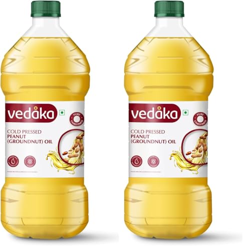 Image of Amazon Brand - Vedaka Cold Pressed Groundnut Oil 2L | Peanut Oil | Cooking Oil | Kolhu /Kacchi Ghani /Mara Chekku /Ganuga | Pure & Unrefined | Rich Aroma & Flavour Of Groundnuts (Pack of 2)