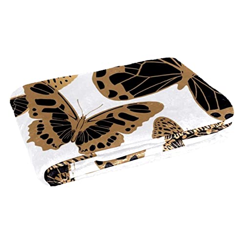 Couverture douce papillon pour des moments cocooning chaleureux au lit