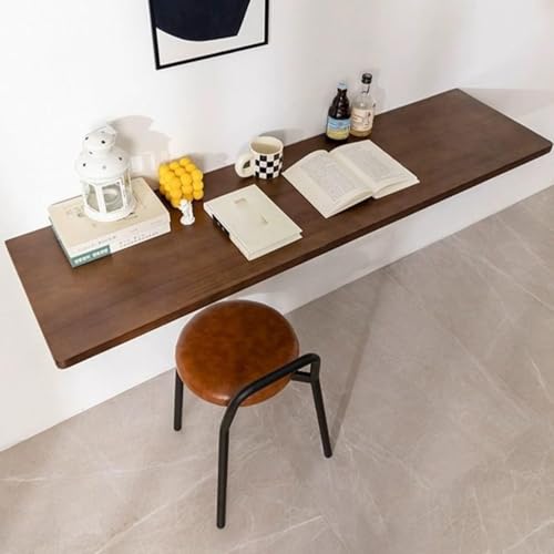 Table pliable murale en bois pour aménager un petit espace studio