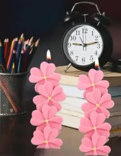 Velas de flores rosas decorativas para ambientar el hogar con elegancia