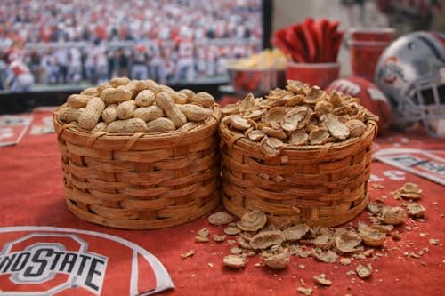 Double Peanut Amish Handmade Basket One Side Holds the Uncracked Peanuts Still in the Shell Other Side Holds Hulls Until Ready to Be Discarded in the Trash or Recycle Bin. Great Idea for Any Man Cave or Bar. Can Also Be Placed on the Coffee Table in Front of the Television. A Healthy Snack for the Family, Kids, or Guests. A Rivet Connects the Two Baskets That Allows Easy Dumping Weaved Basket Colors Will Vary Each Container Measures 6 1/2 X 4 1/4. Total 13 Inches Long